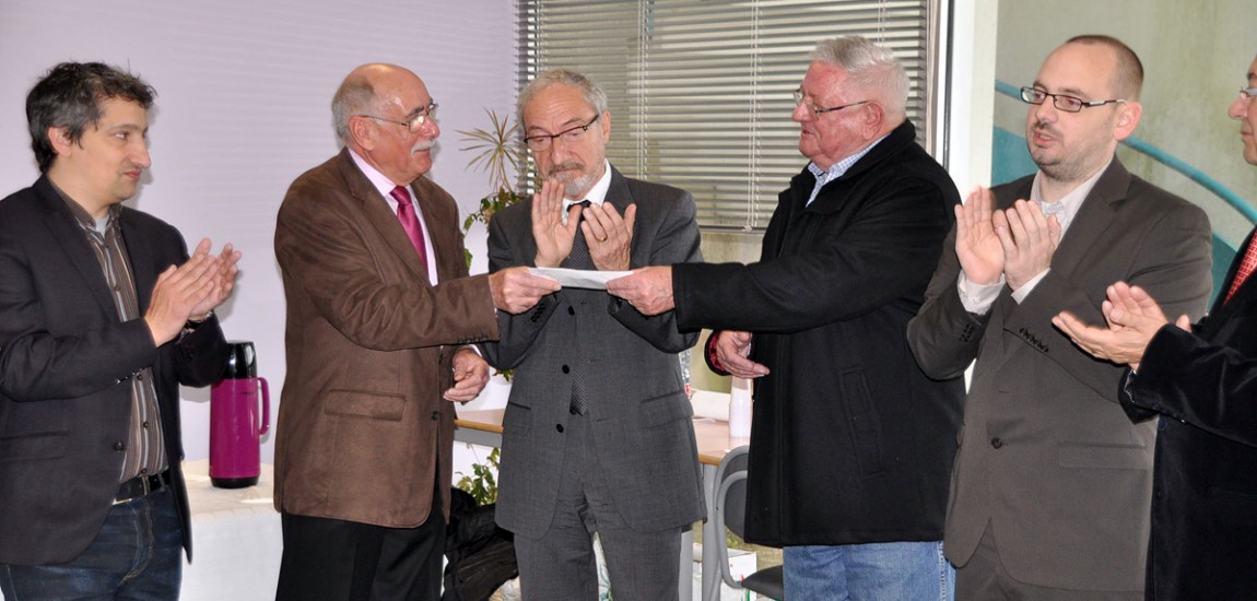 20105-remise-du-cheque-au-profit-des-restos-du-coeur-2